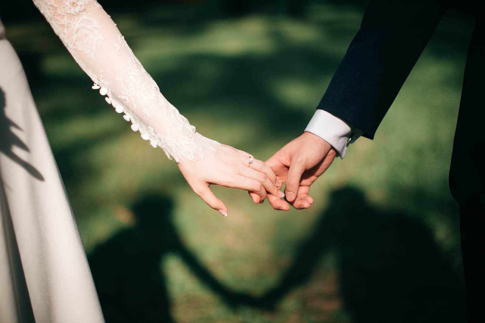 Detail: hands with wedding ring